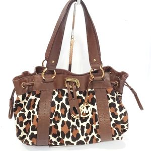 Michael Kors canvas & leather brown animal print  drawstring handbag